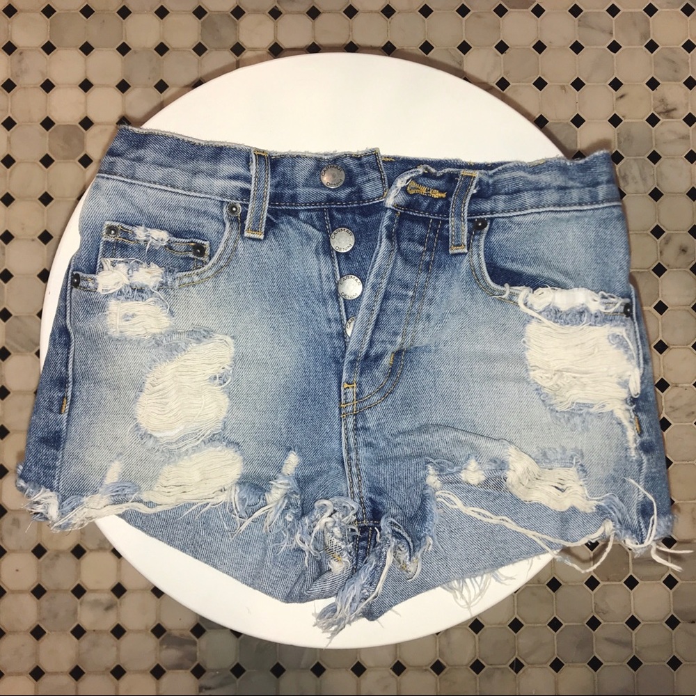 Distressed Carmar jean shorts